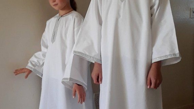 Unveiling the Symbolism: The Story Behind Baptism Robes